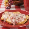 Chipped Beef on toast on a red plate