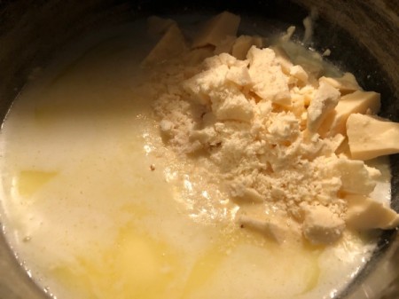 adding chopped white chocolate to pan