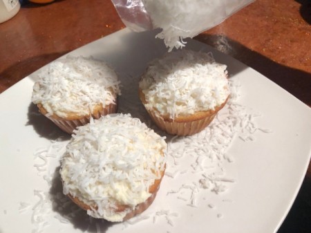 Sprinkling Coconut on Frosting