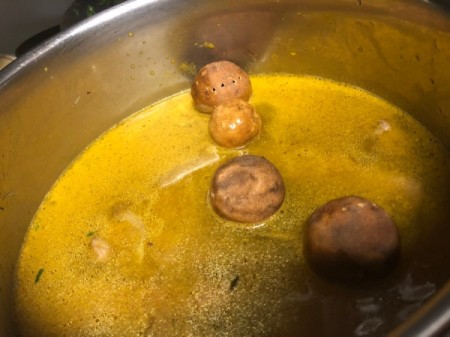 adding pierced dried limes to pot
