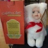 Value of Ashley Belle Porcelain Dolls - doll in fuzzy white suit