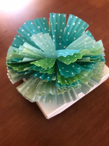 Present Topper from Cupcake Liners - pouf and attach to the box
