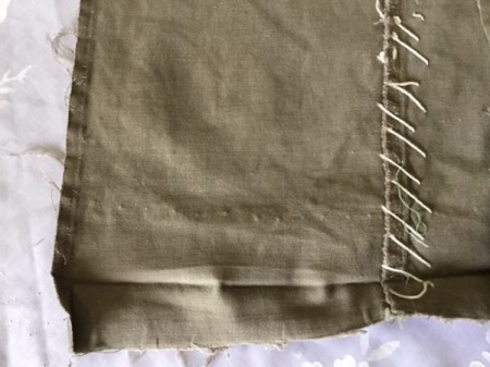 How to Turn Pants Into Shorts and a Bag - undo hems