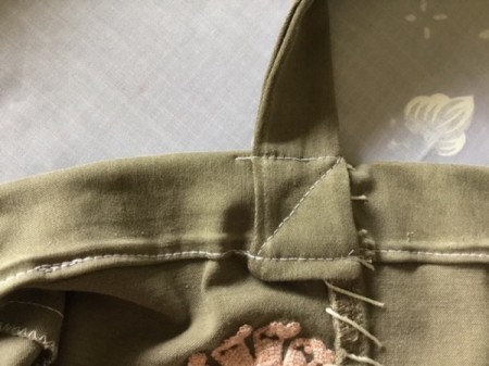 How to Turn Pants Into Shorts and a Bag - sew handles to sides using a zig zag stitch