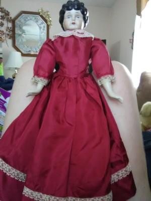 Identifying a Porcelain Doll - old style doll with porcelain head, arms, and legs and cloth body