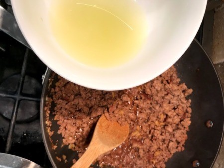 adding lime juice to Ground Pork