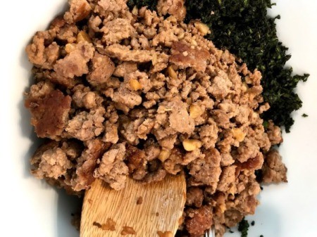 mixing Ground Pork with Herbs