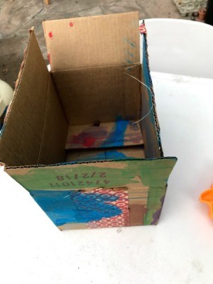 Recycled Cardboard Box as a Child's Canvas - painted shipping box