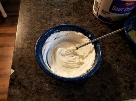 A container of ranch dip.