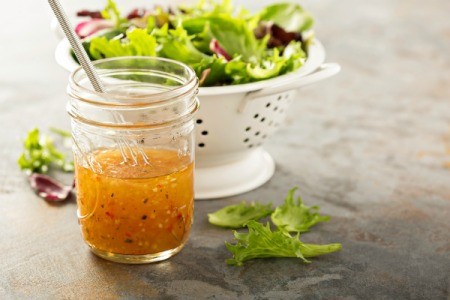 Italian vinaigrette dressing in a mason jar.