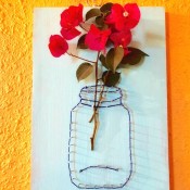 Yarn and Nail Wall-Hanging Vase - hang on wall