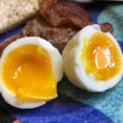 A softboiled egg cut into half.