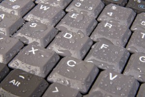 Close up of wet laptop keys