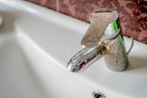 Hard Water Stains on sink faucet.
