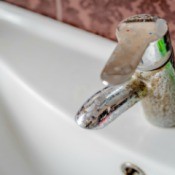 Hard Water Stains on sink faucet.