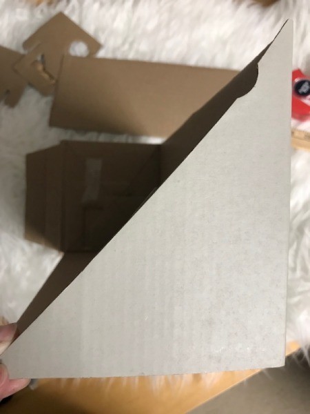 Recycled Cardboard Shelf - diagonally cut end