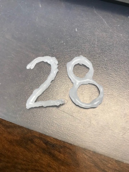 Confetti Birthday Number Cake Topper - peel off parchment paper