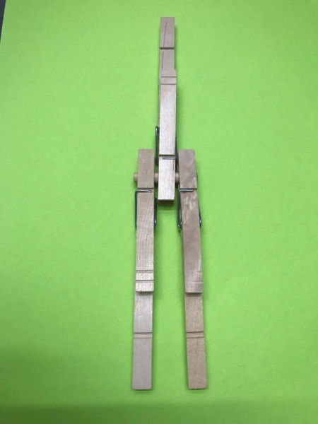 Mini Wooden Clothespin Easel - clip the third to the center of the dowel
