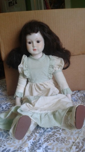 Identifying a Porcelain Doll - doll sitting in front of a box
