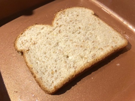 buttered bread on grill