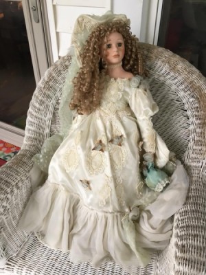 Identifying a Porcelain Doll - doll wearing a long white dress