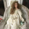 Identifying a Porcelain Doll - doll wearing a long white dress