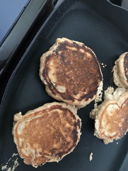 Pancakes flipped on griddle