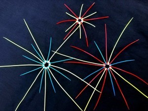 Zip Tie Fireworks Decor - three fireworks bursting decorating hanging in a cluster