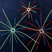 Zip Tie Fireworks Decor - three fireworks bursting decorating hanging in a cluster