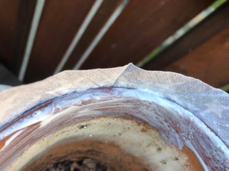 Napkin Decoupaged Flower Pot - brush Mod Podge onto the lip and down slightly into the pot