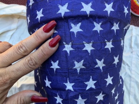 Napkin Decoupaged Flower Pot - gently press the napkin onto the pot