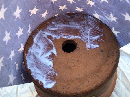 Napkin Decoupaged Flower Pot - apply Mod Podge to bottom of the pot