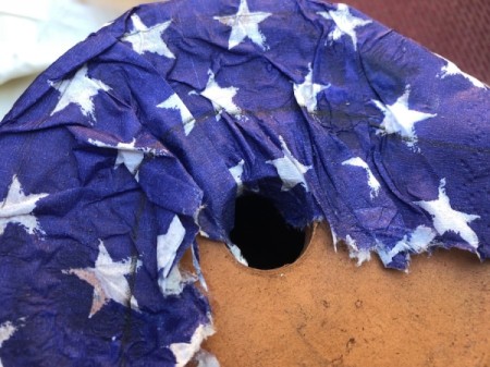 Napkin Decoupaged Flower Pot - fold napkin under and press down leaving the drainage hole open