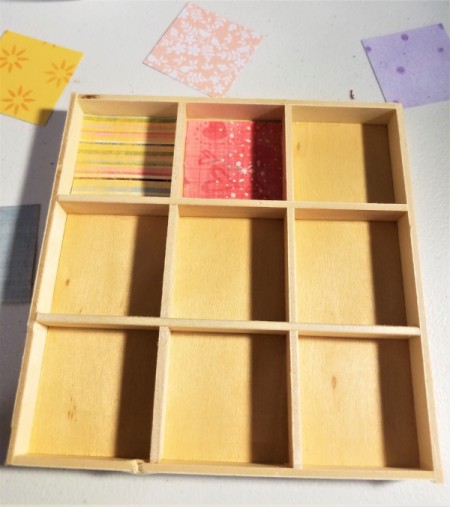 Scrabble Nine Patch Shadow Box - gluing paper in spaces