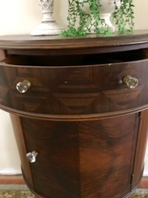 Value of a Mersman Demilune Table 4815 - half circle table with a drawer and storage area below