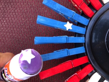 American Flag Clothespin Platter - glue stars to blue pins