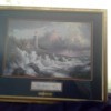 Value of Thomas Kinkade Conquering the Storms - stormy seas and lighthouse