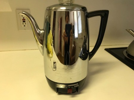 A percolator that was purchased at a thrift store.