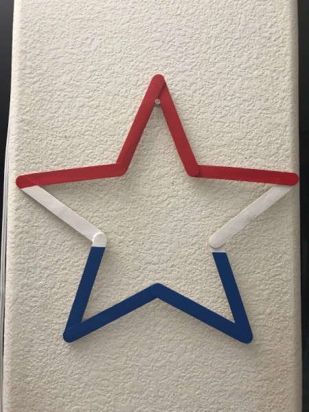 Fourth of July Star Decoration - four red and two painted white, allow to dry