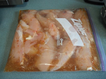 chicken marinating in bag