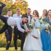 Man in wedding party drops the cake.