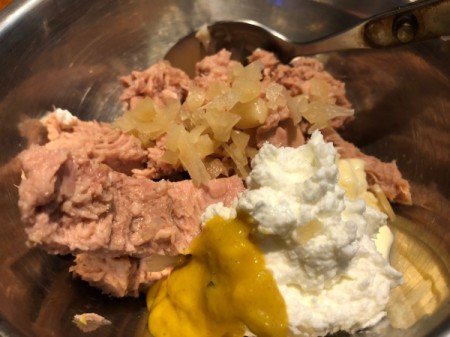 Tuna, apples, mayonnaise, mustard in bowl