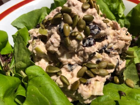 Cranberry Apple Tuna Saladon lettuce, with pumpkin seeds