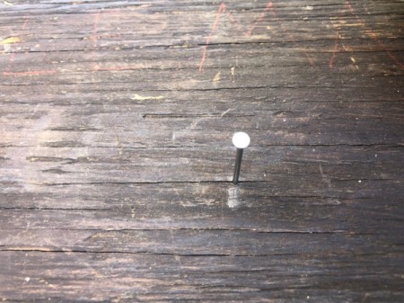 Laundry Room Sock Matching Sign - hammer a nail into the center of the plank