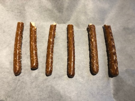pretzel sticks on parchment paper