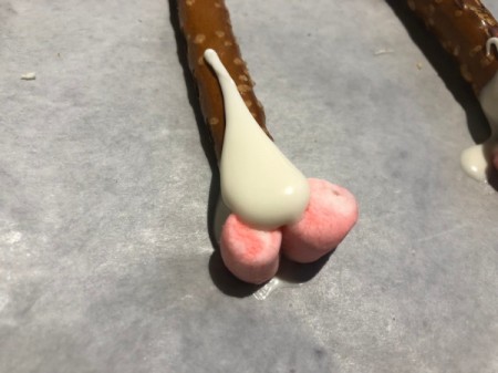 securing marshmallows to stick with candy melt