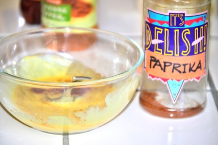 adding cayenne and paprika