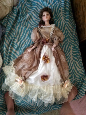 Identifying a Golden Keepsakes Doll  - doll wearing a long mauve dress with a white ruffled petticoat