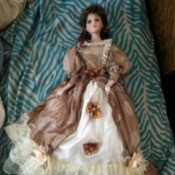 Identifying a Golden Keepsakes Doll - doll wearing a long mauve dress with a white ruffled petticoat
