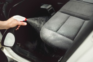 Spraying car upholstery.